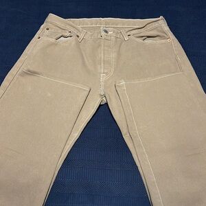 Khaki brand new Levi’s jeans 501 fit.